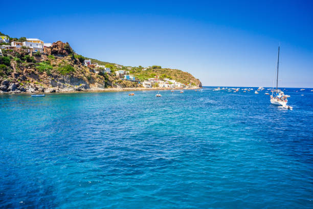 Amazing beach of island Panarea in Mediterranean sea Amazing beach of island Panarea in Mediterranean sea with crystall clear blue water in Italy. panarea island stock pictures, royalty-free photos & images