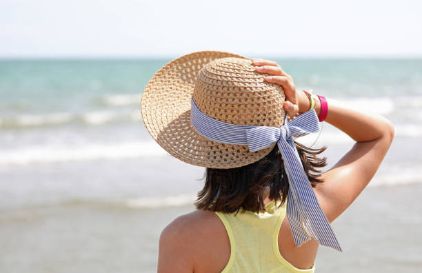 istock Little girl with straw hat called boater 1179423204