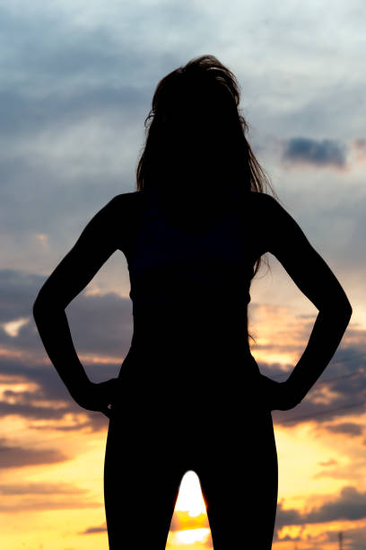 istock Silhouette of woman with sunlight 1179432260