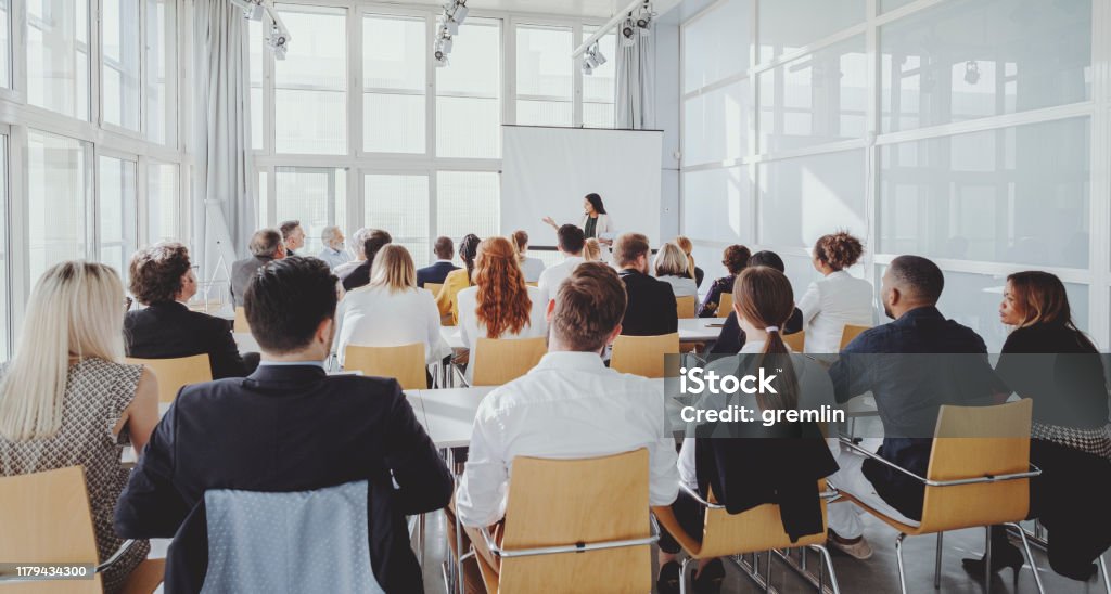 Indian businesswoman leading the seminar Indian businesswoman leading the seminar. Education Training Class Stock Photo