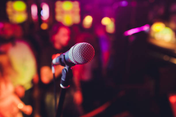 Microphone. Microphone close-up. A pub. Bar. A restaurant. Classical music. Music. stock photo