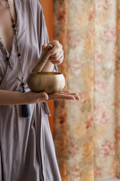 istock Woman holding in hands singing bowl 1179436178