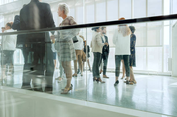 istock Group of business people in convention center 1179436836