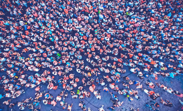 istock Aerial. People crowd background. Top view. Toned image. 1179437380