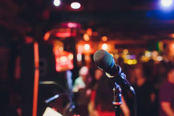 Photo of Microphone. Microphone close-up. A pub. Bar. A restaurant. Classical music. Music.