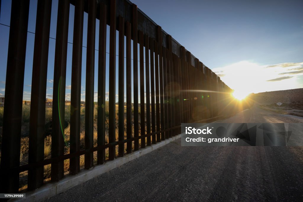 Dramatic Image of the US/Mexico Border Wall at Port Anapra Near El Paso Texas International Border Barrier Stock Photo
