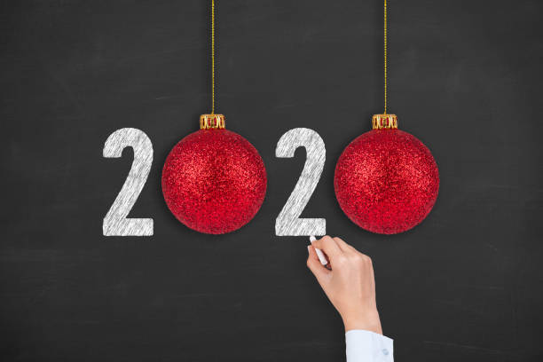 istock New year concepts 2020 on Chalkboard Background 1179440535