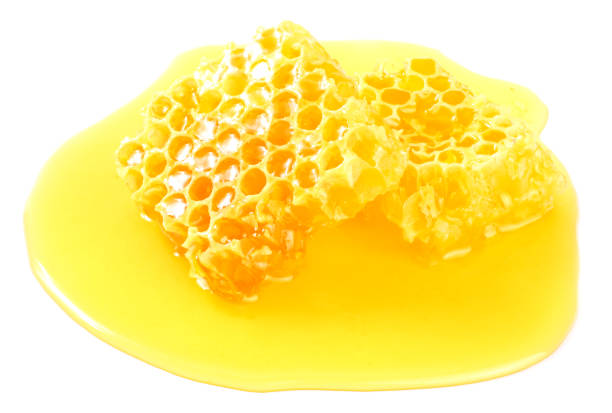 istock Honeycomb with honey isolated on white background 1179442256