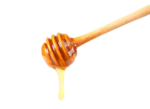 istock honey dripping isolated on a white background 1179442257
