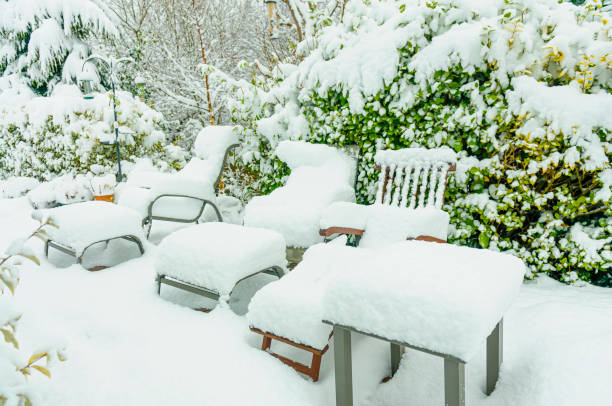 istock Garden furniture covered with snow 1179442796