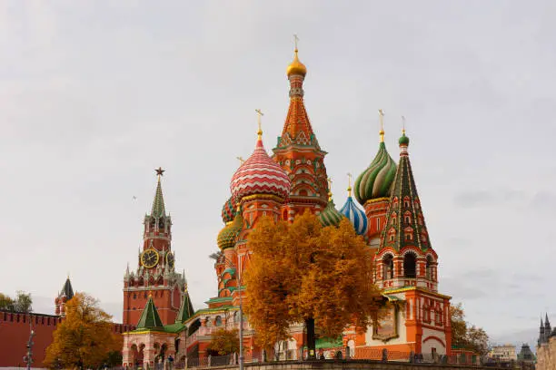 Saint Basilâs Cathedral on Red Square of Moscow, Russia, Spassky (Saviorâs) tower of the Kremlin in autumn. Travel or tourism theme or decoration