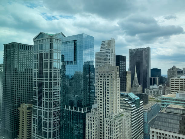 aerial view of a military jet over chicago loop skyscrapers on cloudy afternoon - blue angels imagens e fotografias de stock