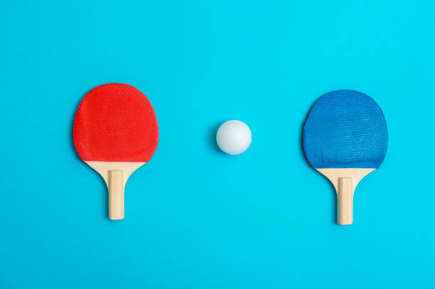 istock Two rackets for playing table tennis on blue background 1179445460