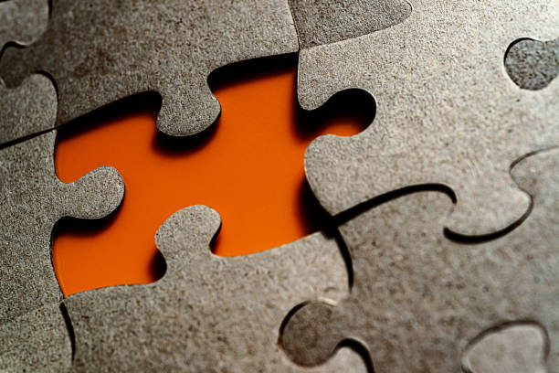 missing puzzle piece - teamwork absence blank jigsaw puzzle imagens e fotografias de stock