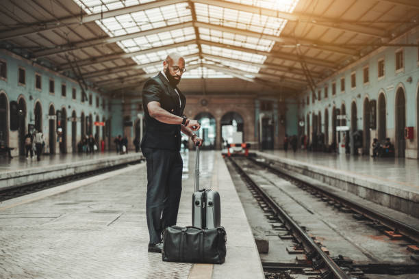 istock African man on the railroad platform 1179446975