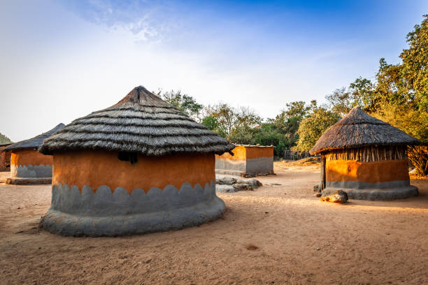 local village with traditional zimbabwian huts from clay and hay. matobo, matabeleland province, zimbabwe, africa - zimbabwe imagens e fotografias de stock