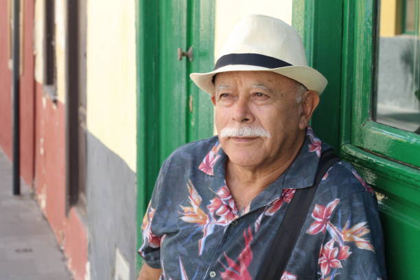 Cute senior Hispanic man looking away Cute senior Hispanic man looking away. puerto rican ethnicity stock pictures, royalty-free photos & images