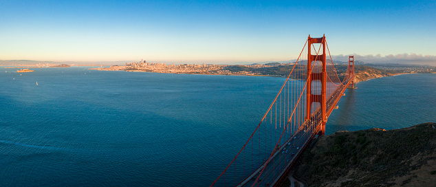 Aerial sunset view of the Golden Gate Bridge from Battery Spencer, Golden Gate National Recreation Area, in San Francisco, California.