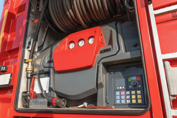 istock Modern control panel and extinguishing hose mounted on fire truck or fire engine, close-up 1179456581