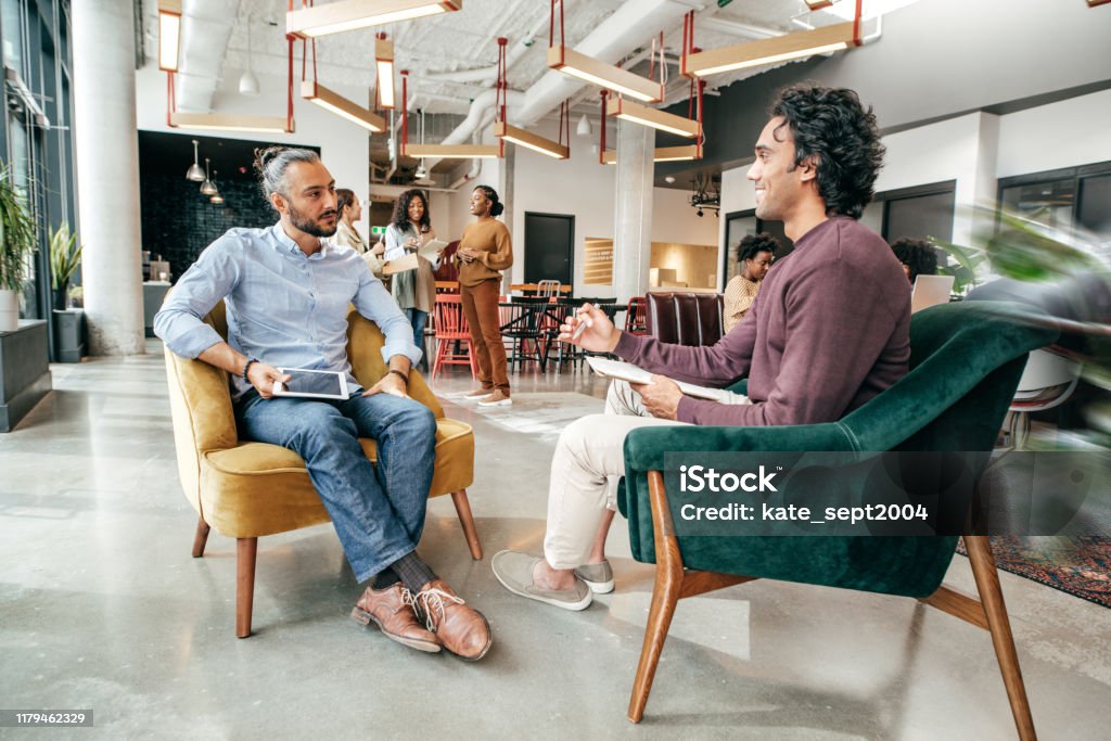 Steps to Take to Become Truly Inclusive at Work Giving and getting financial advice Morality Stock Photo