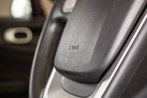 istock Safety airbag sign on car steering wheel 1179462402