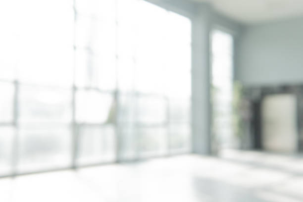 istock Abstract blurred white doctor medical office room background concept for blur empty space grey modern hospital clinic pharmacy, light clean interior retail sale, blue glare window hallway building 1179462556