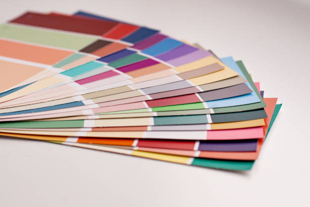 istock Color palette with various samples. Light background. Paint selection cards, close-up. 1179462632