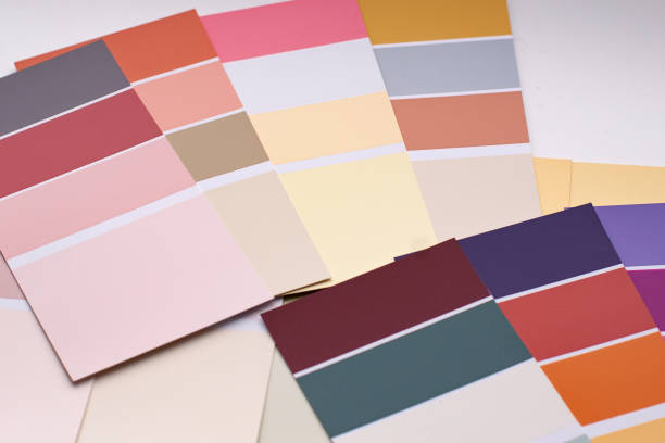 istock Color palette with various samples. Light background. Paint selection cards, close-up. 1179462633