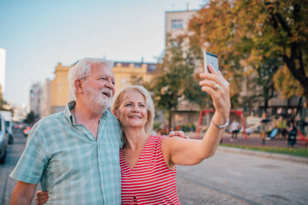 istock An old couple taking selfies 1179463312