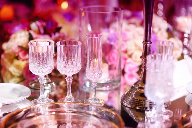 istock Beautiful table setting with crockery and flowers for a party, wedding reception or other festive event 1179468403
