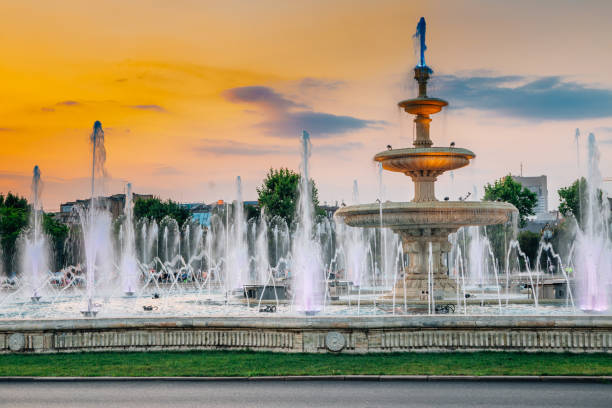 istock Fountains with sunset at Unirii Square in Bucharest, Romania 1179473645
