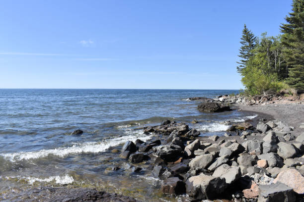 istock Lake Superior Shore with Trees 1179477382