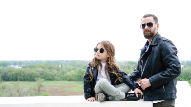 istock Dad and daughter walk around the city 1179478036