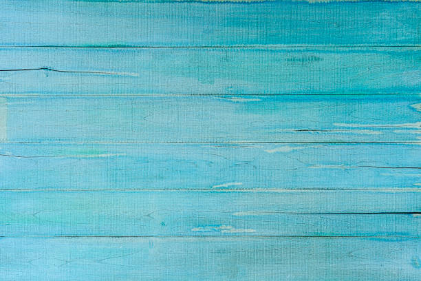 istock Weathered, pastel, turquoise and blue colored wooden panel abstract background. 1179478064