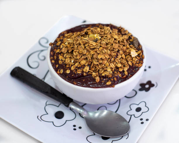 istock bowl of acai berry with granola 1179478079