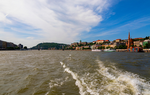Budapest Hungary 4.30.2018: View of Budapest from a river cruise as sailing across the city.  Budapest is a World Heritage Site.