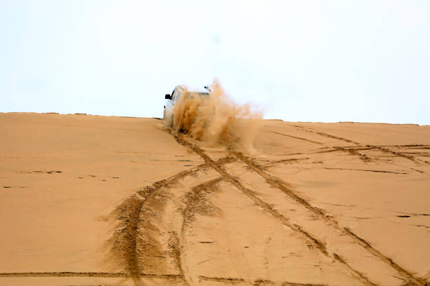 istock An suv was driving in the desert 1179479990