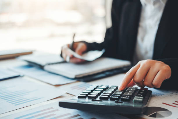 istock Co-working Business Accounting investment and saving cost discussing new plan financial graph data 1179484706