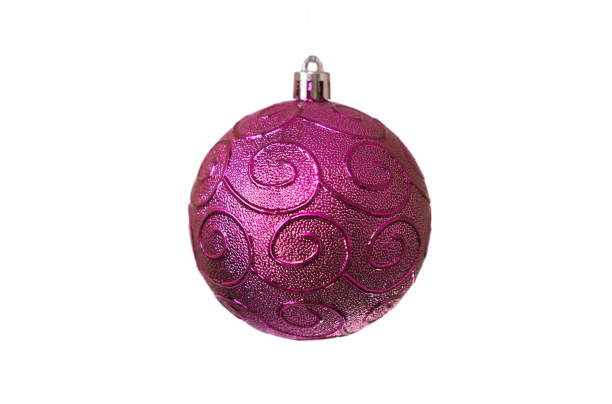 istock Christmas purple toy with spiral patterns for decoration on a white background, isolated, soft focus 1179486097