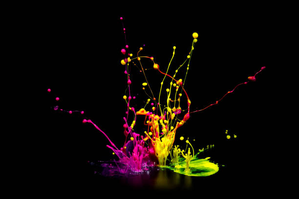 istock Colorful paint splashing on audio speaker isolated on black background 1179486136