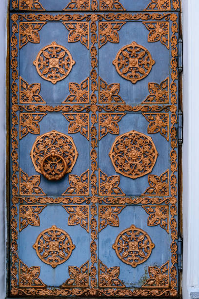 istock Closeup of the old door with fancy pattern 1179488020