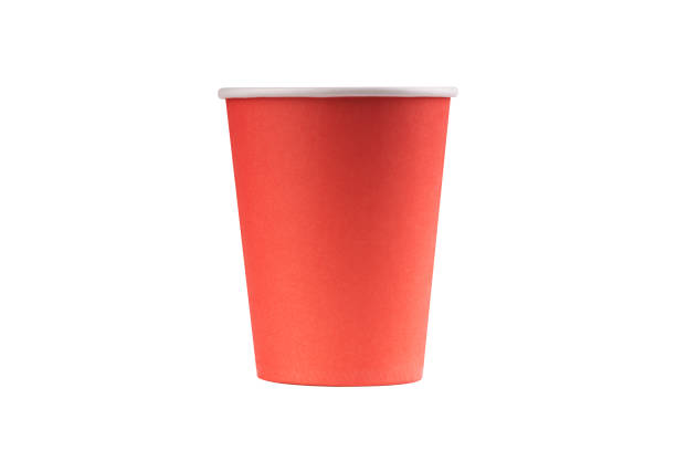 red coral paper cup isolated on white background. utensil and disposable kitchenware. coffee to go cup mockup.