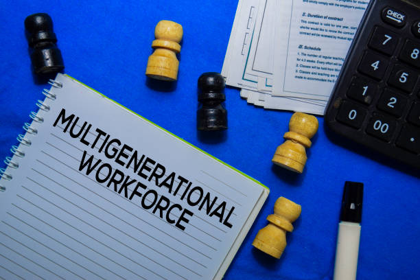 istock Multigenerational Workforce text on a book isolated on office desk. 1179491354