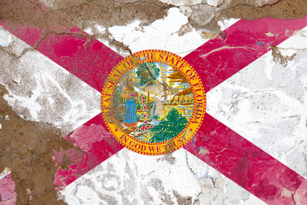 istock Florida grunge, damaged, scratch, old style state flag on wall. 1179506242