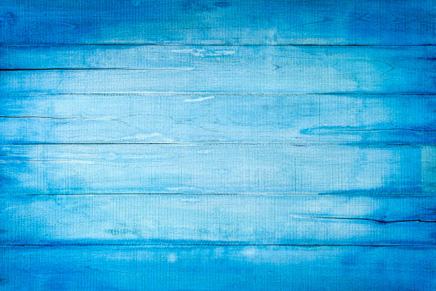 istock Weathered, pastel, turquoise and blue colored wooden panel abstract background. 1179509326