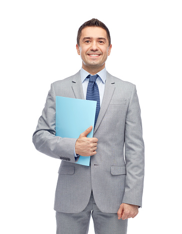 business, people, finances and paper work concept - happy smiling businessman in suit holding folder