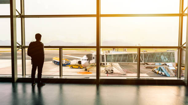 istock trip Summer flight on the gate in airport Background. 1179511468