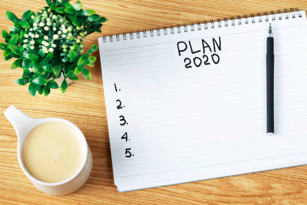 istock Inscription Plan 2020 in notepad, close-up, top view, concept of planning, goal setting 1179511663