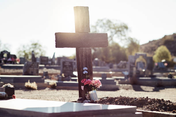 Blank gravestone with other graves in the background