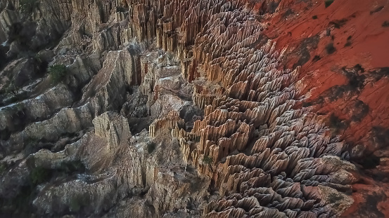 Aerial view of a drone, with rare geological phenomenon, cliffs of clayey clay with erosion, strange forms, locally called Miradouro da Lua, in Angola